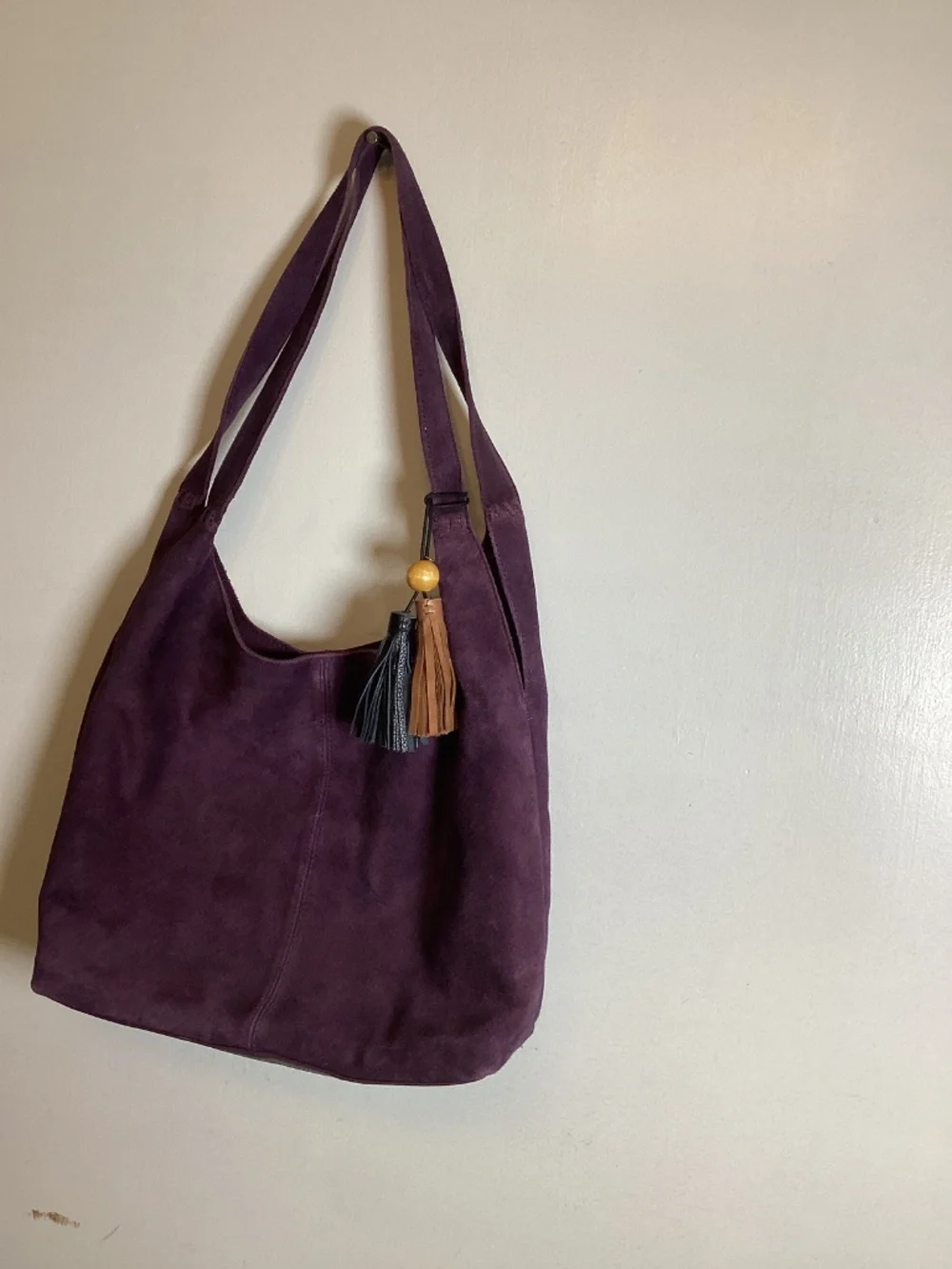 The Sak suede hobo with contrast tassels with wooden bead accent #boho # suede